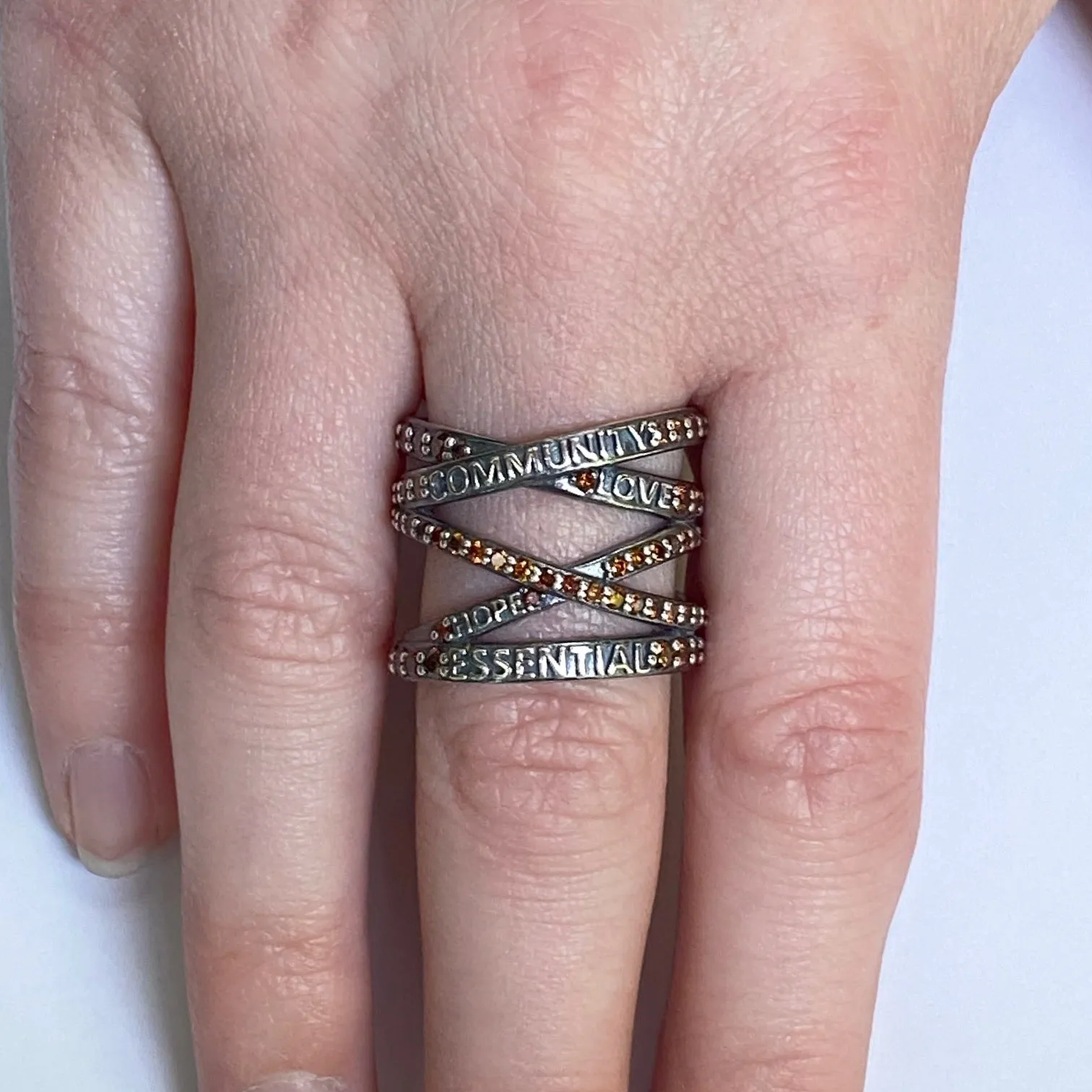 Not Non-Essential Ring with Red Diamonds